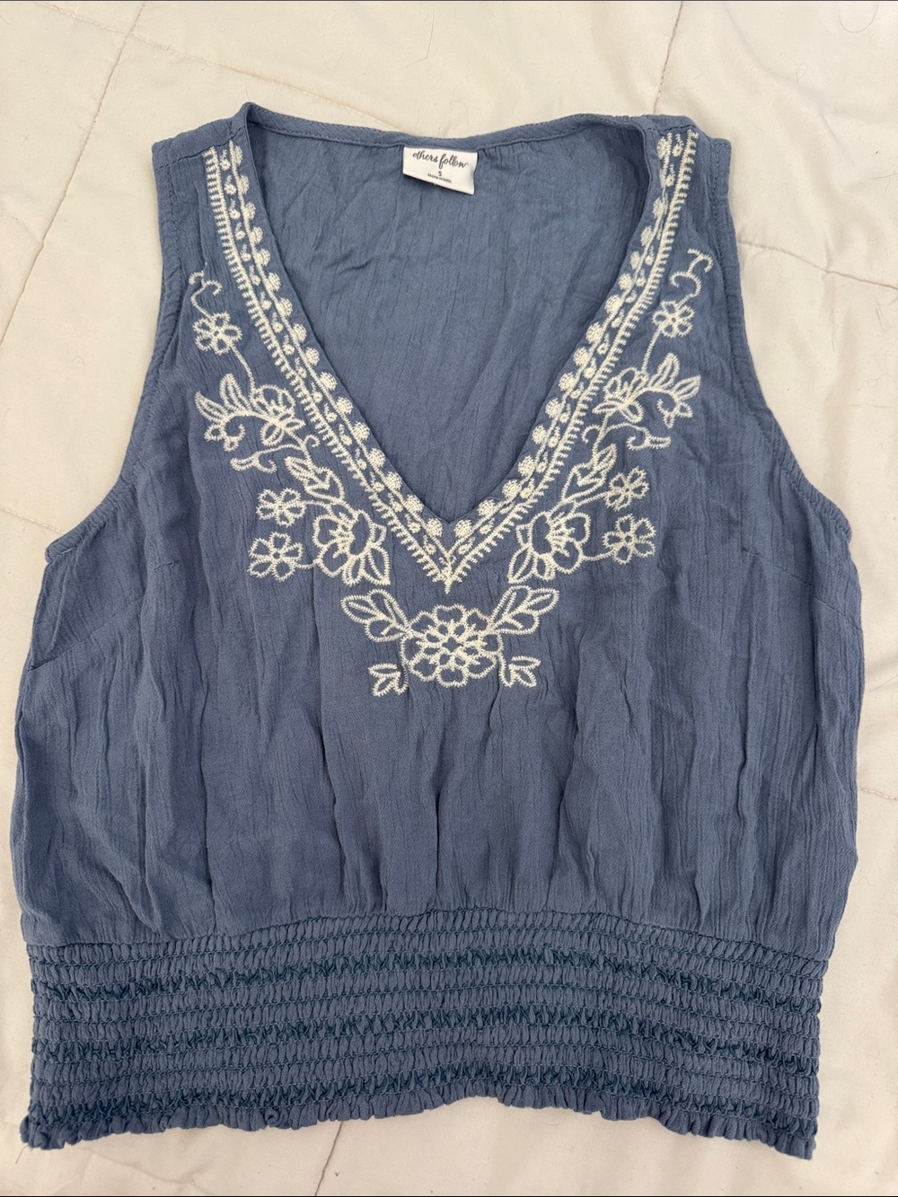 Blue Sleeveless Top with White Floral Embroidery